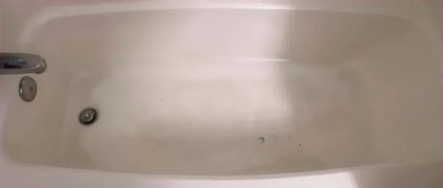 White bathtub after cleaning
